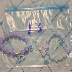 Purple and White Beaded Bracelets